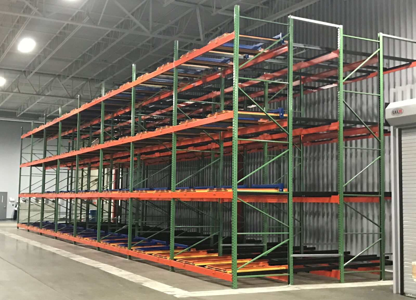Pushback pallet rack carts and deep storage lanes